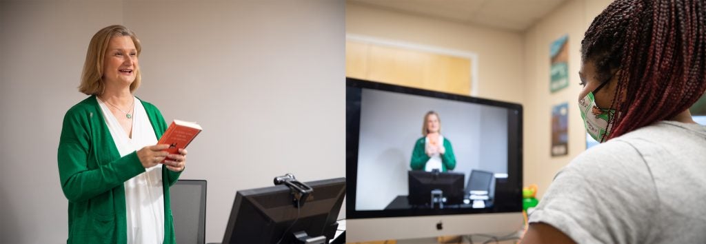 Photograph of a professor and student demonstrating Virtual course delivery.