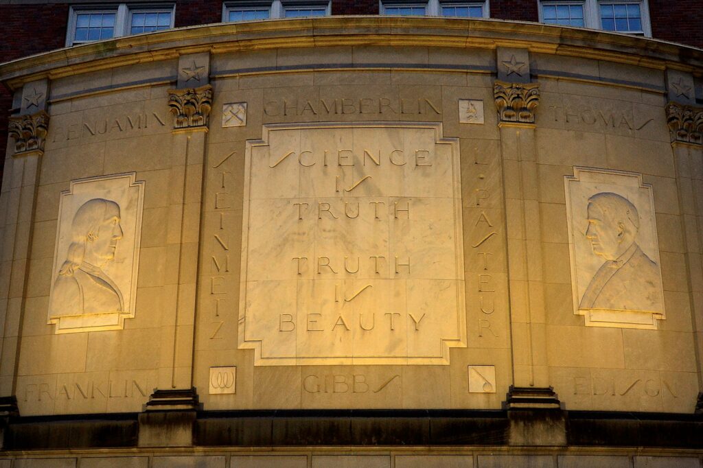 Science is Truth, Truth is Beauty quote on Science Building facade at night