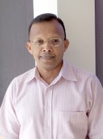 Photo of Dr. Mathew