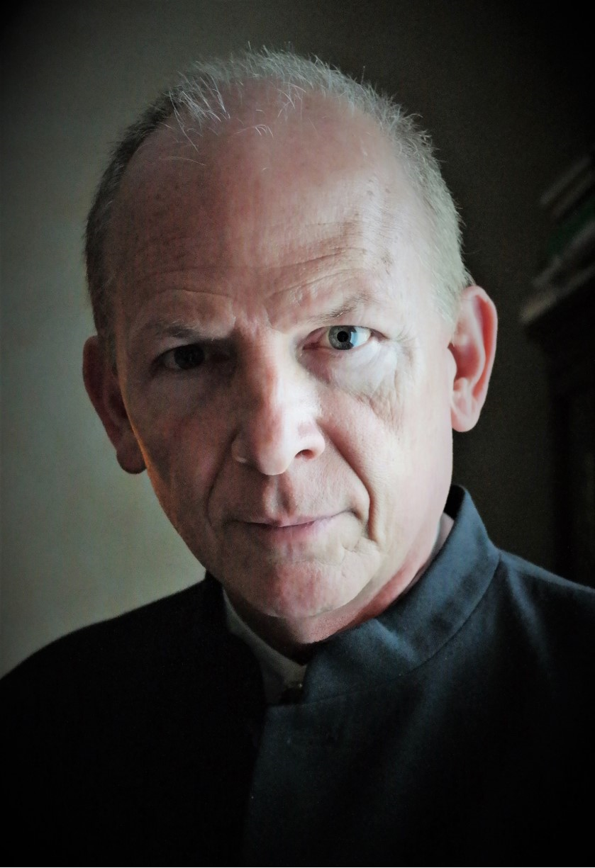 Associate Dean of the College of Arts and Media,<br/>Director of Choral Activities
