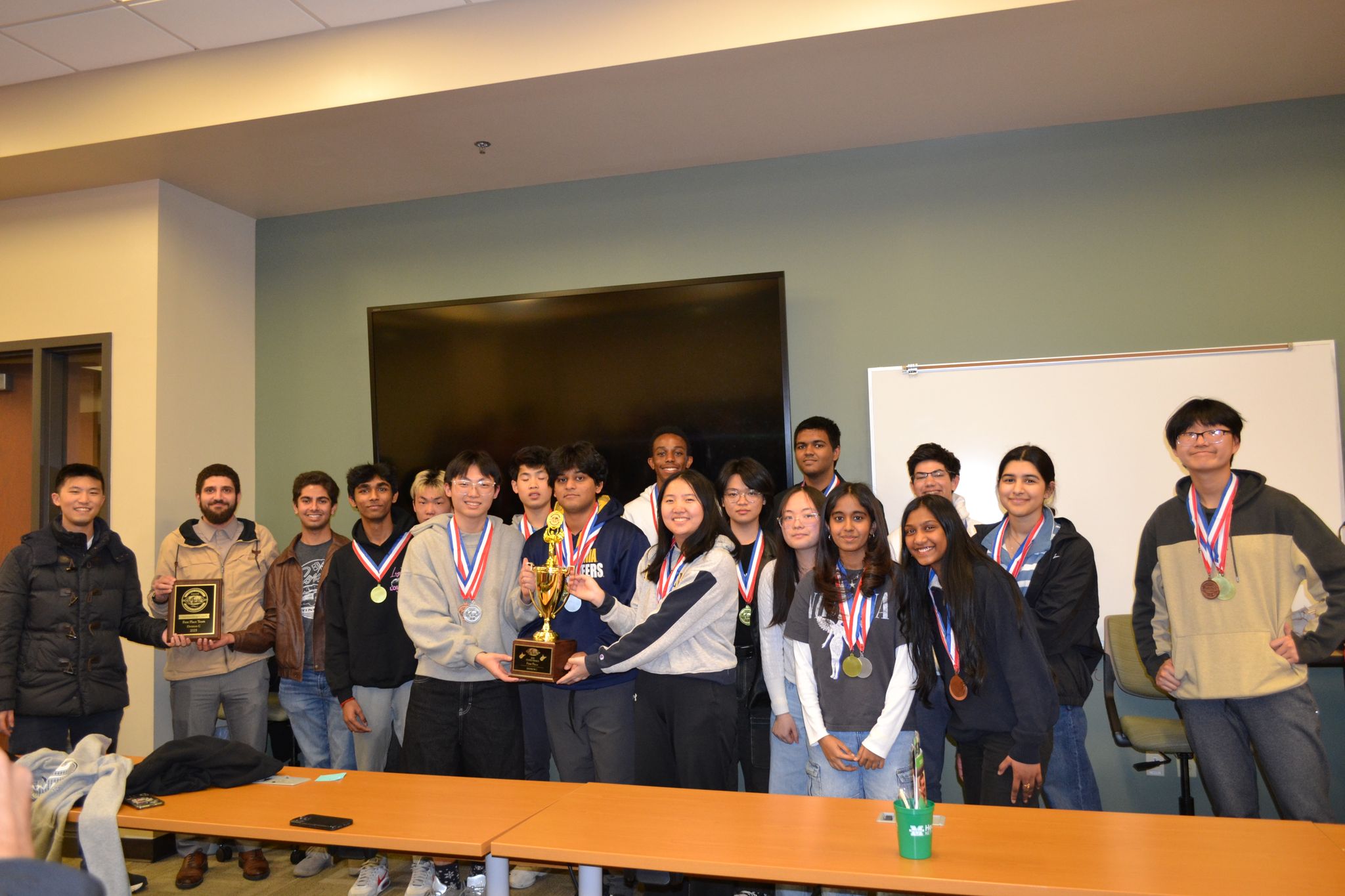 group shot of Morgantown High School with a trophy