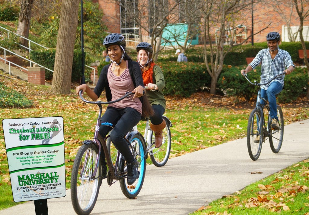 Students bicycling on campus