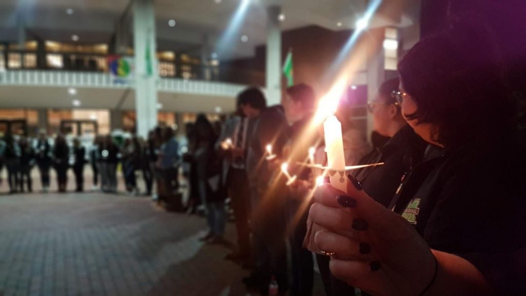 Image of students and Marshall communities members at Take Back the Night Vigil, in honor of survivors of sexual assault.