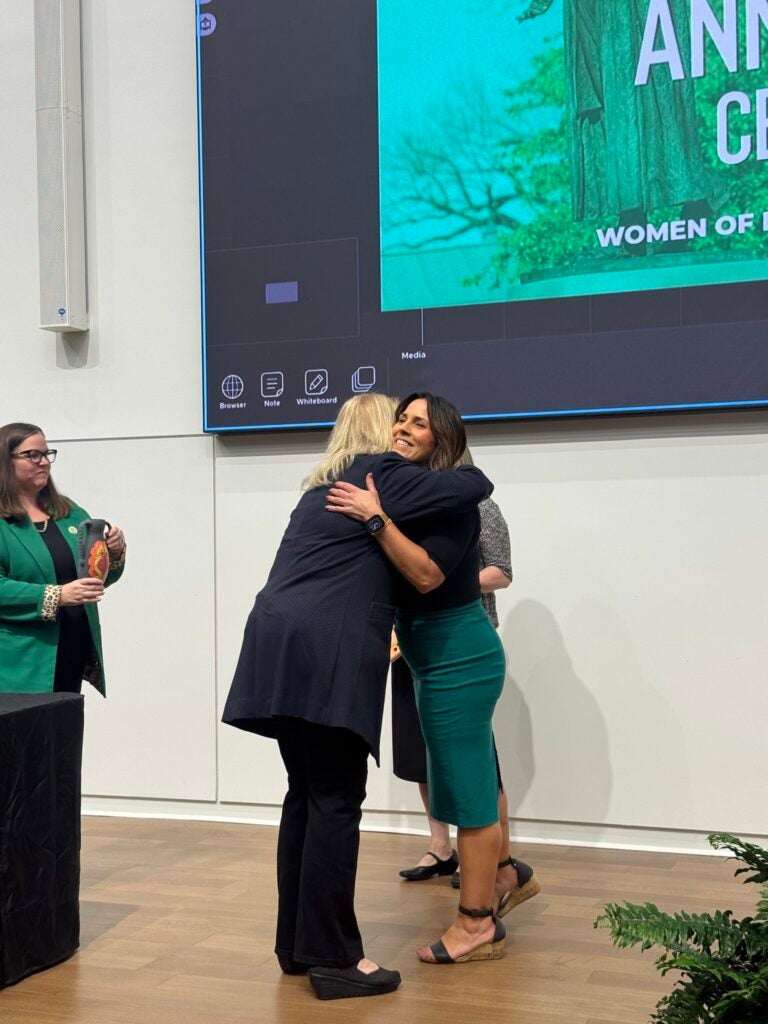 Patricia Proctor hugging Kelli Prejean after receiving the Lifetime Achievement