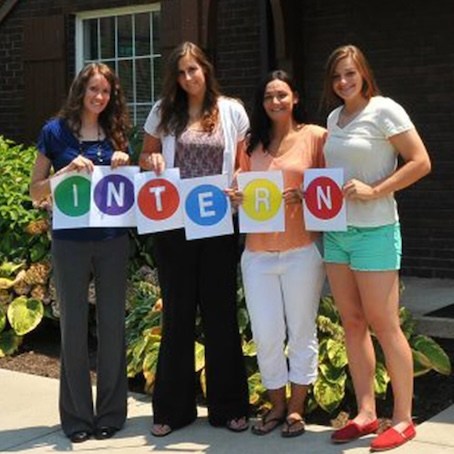 Photo of girls spelling out INTERN