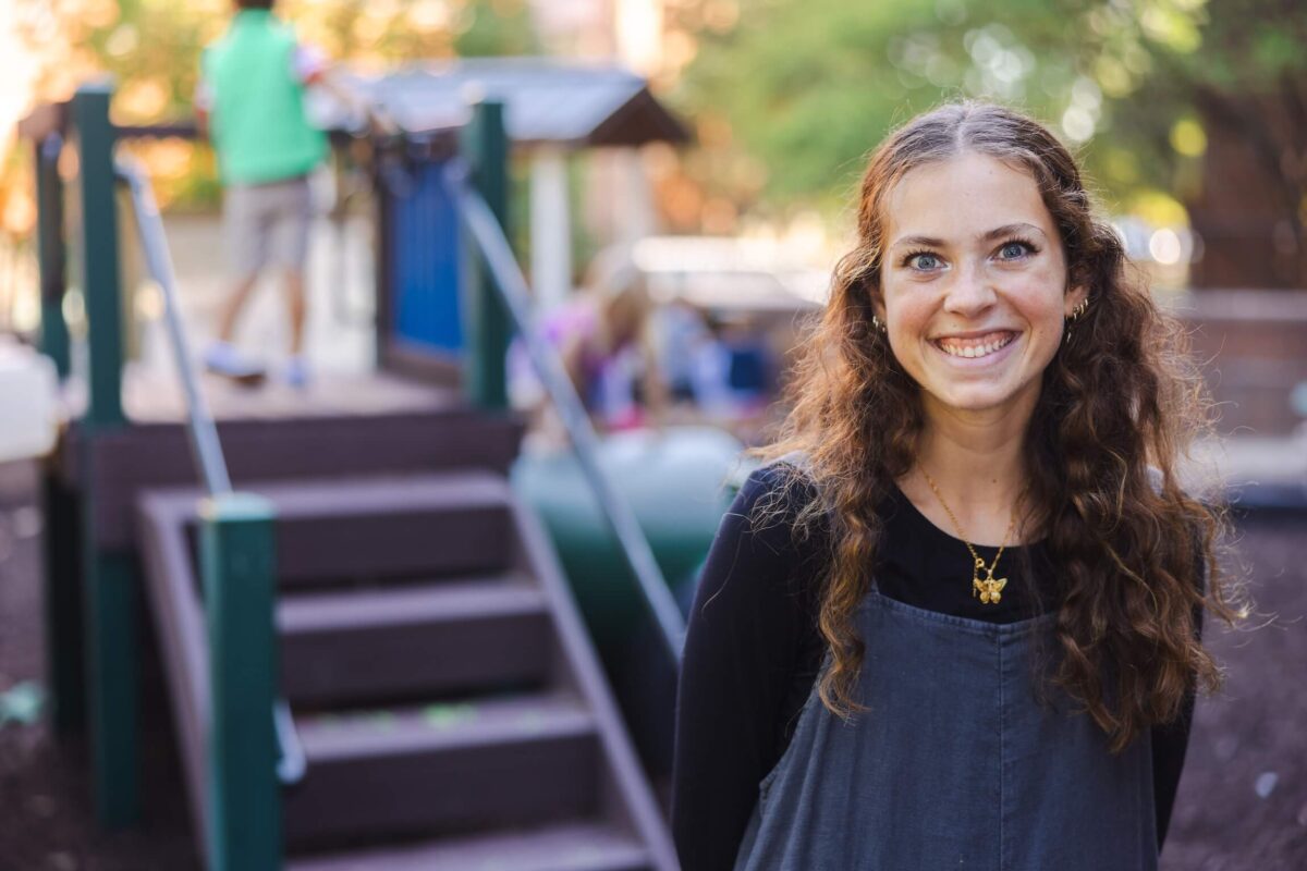 daycare teacher on a playground