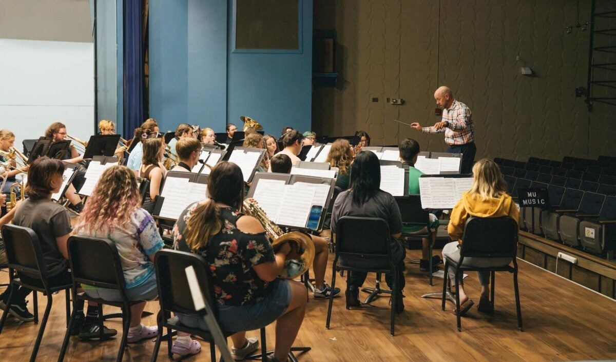 orchestra students practicing a performance
