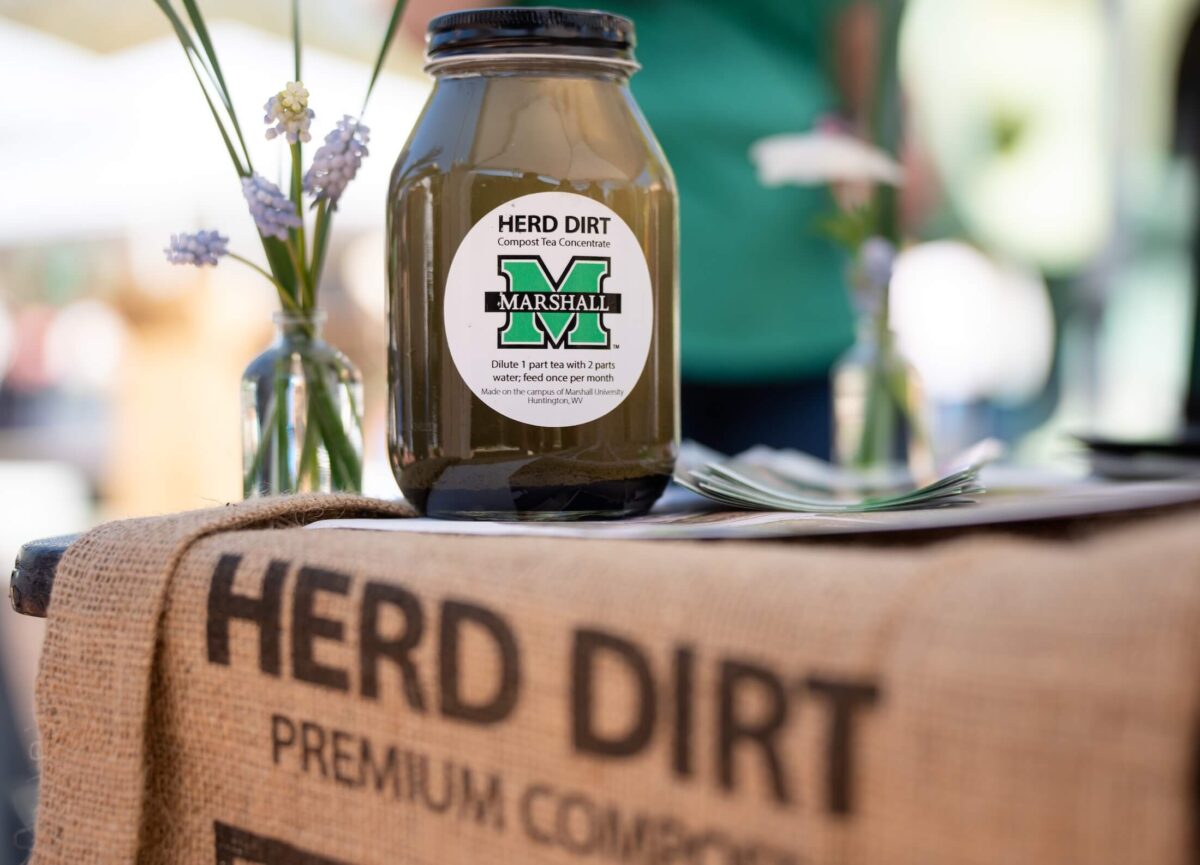 jar of Herd Dirt sitting on a table