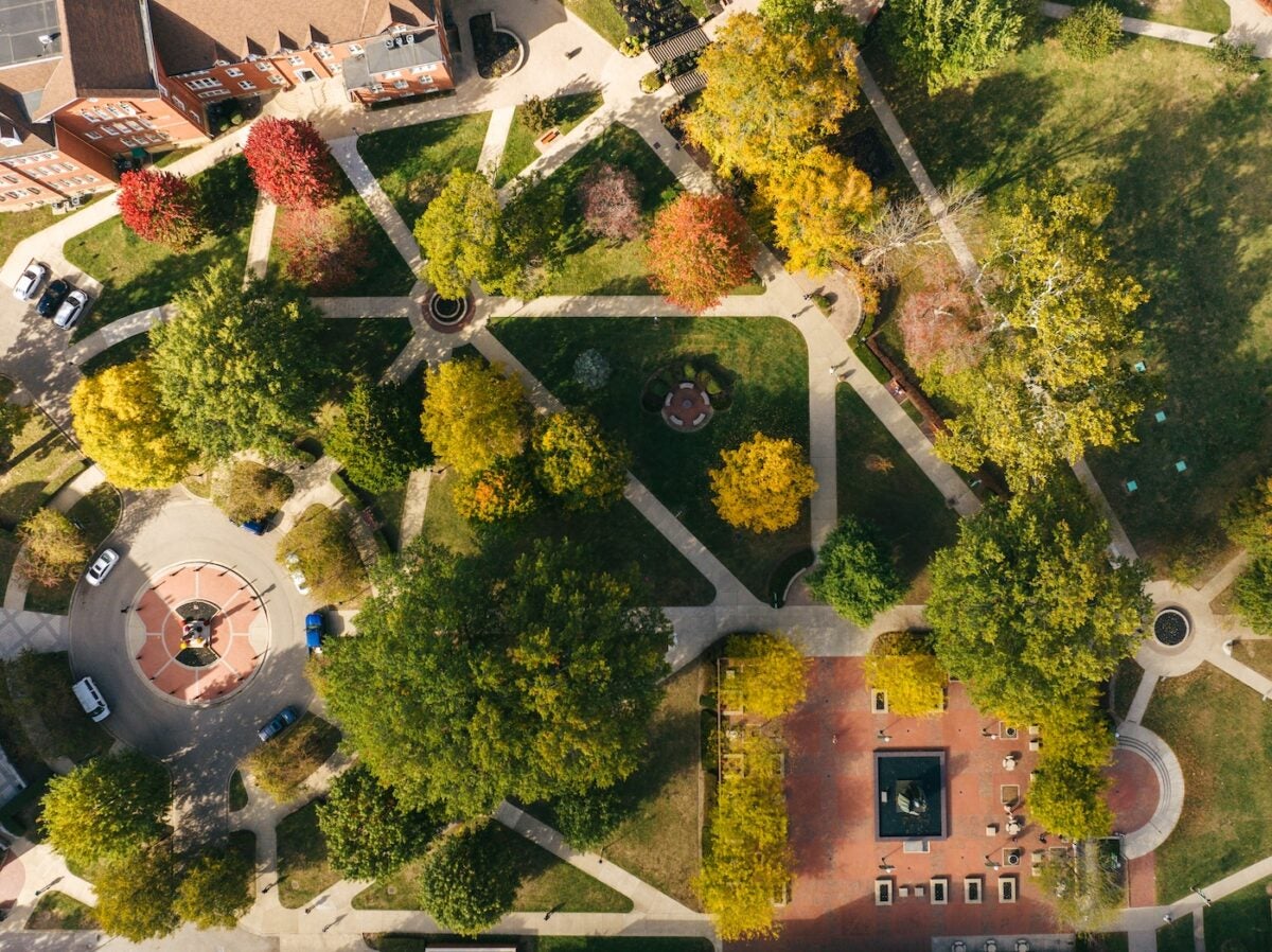drone shot of campus in the fall