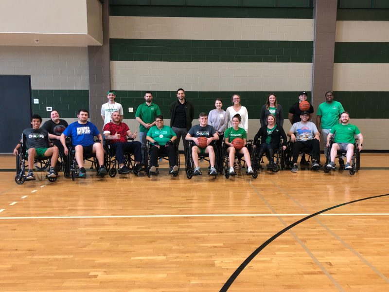 Students gather to play wheelchair basketball at the Marshall University Campus Rec