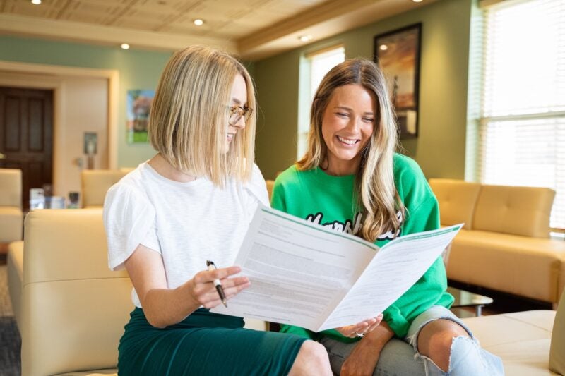 student receiving academic advising from an advisor in the welcome center