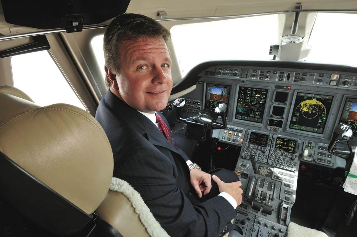 Bill Noe in cockpit of a plane