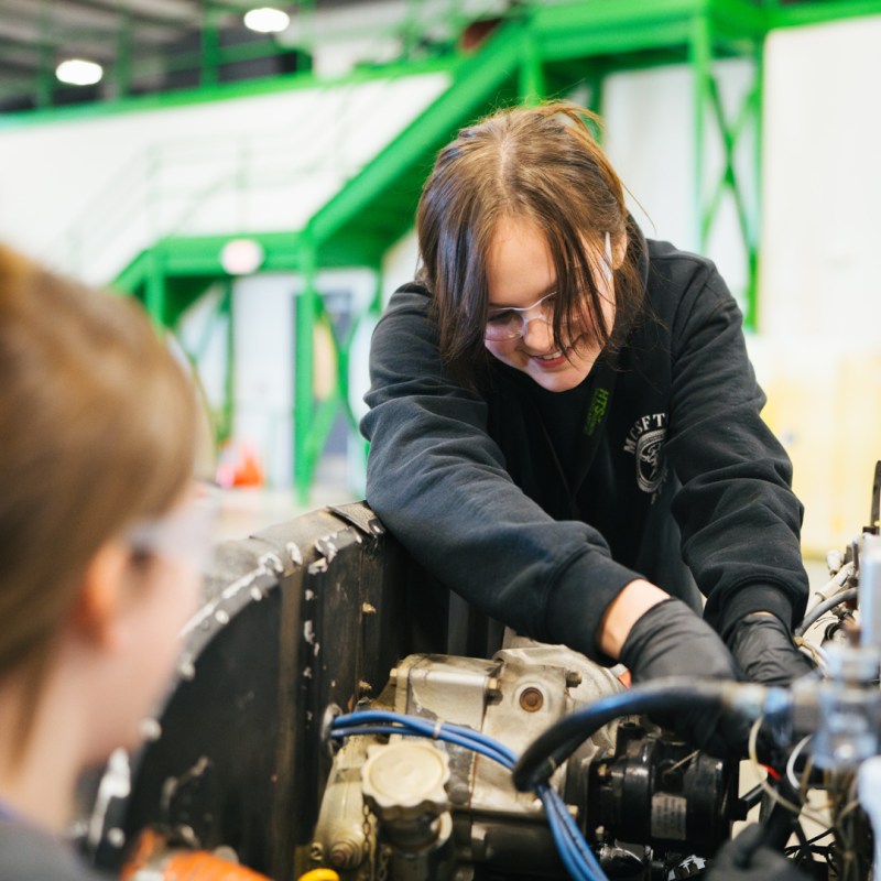 Marshall University Aviation Maintenance Technology students work on an aircraft