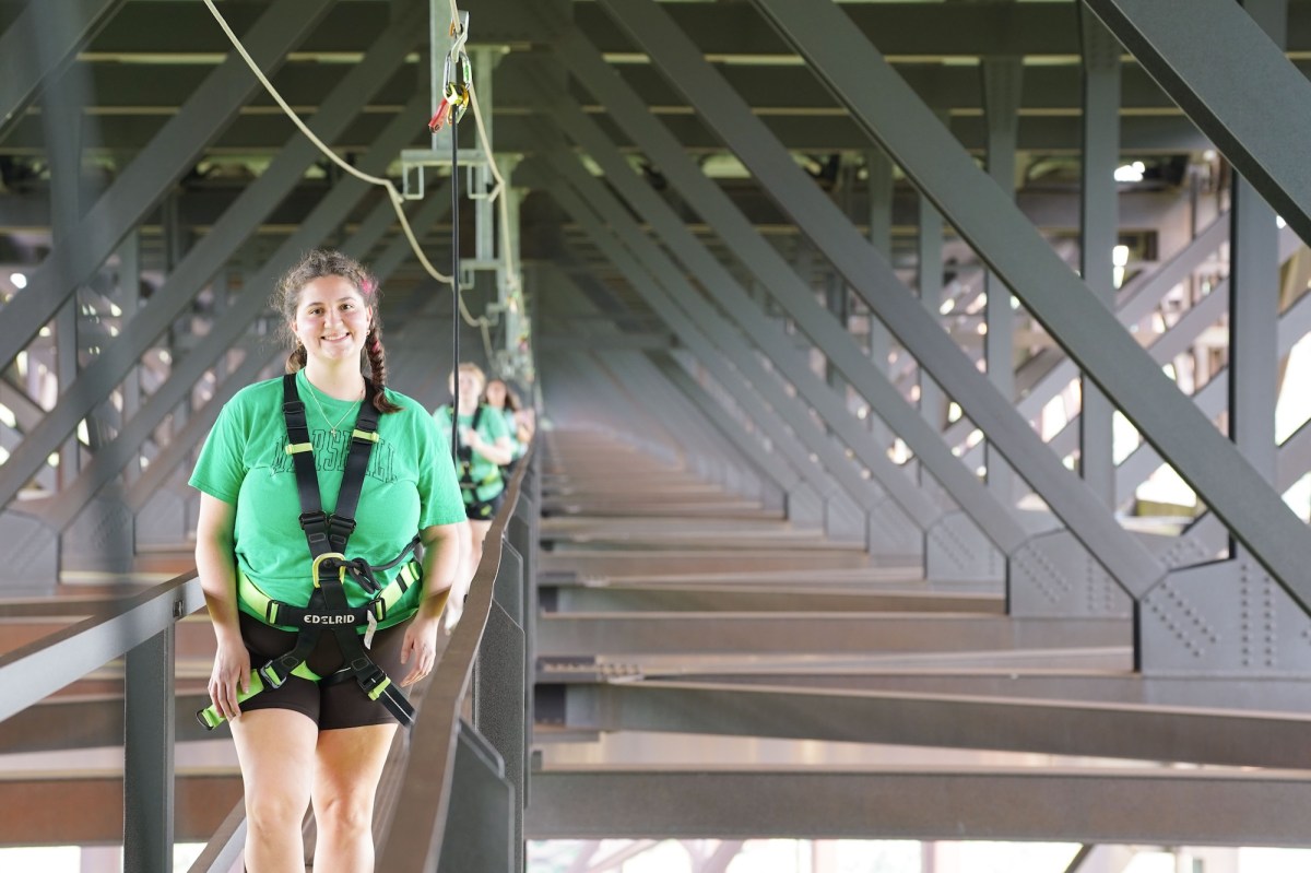 students walking on the Bridge Walk on the New River Gorge bridge