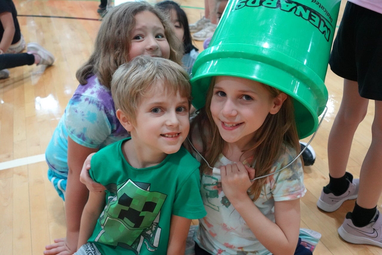 Image of kids in a camp at the rec