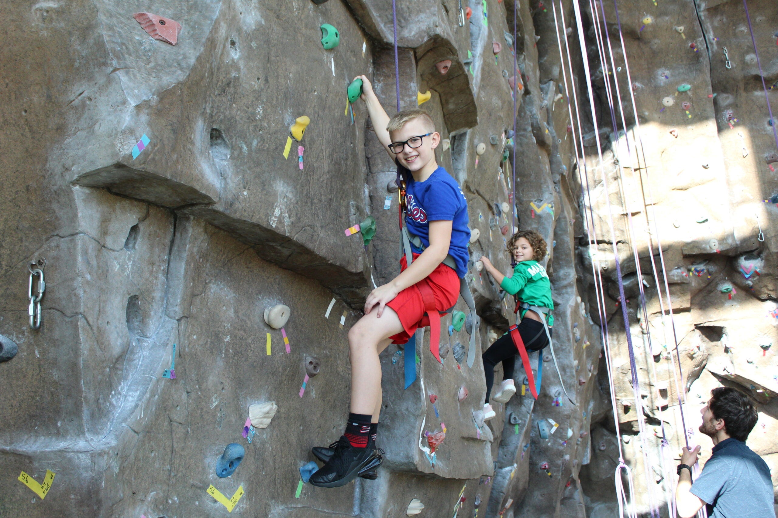 Image of kids on the climbing wall at the rec