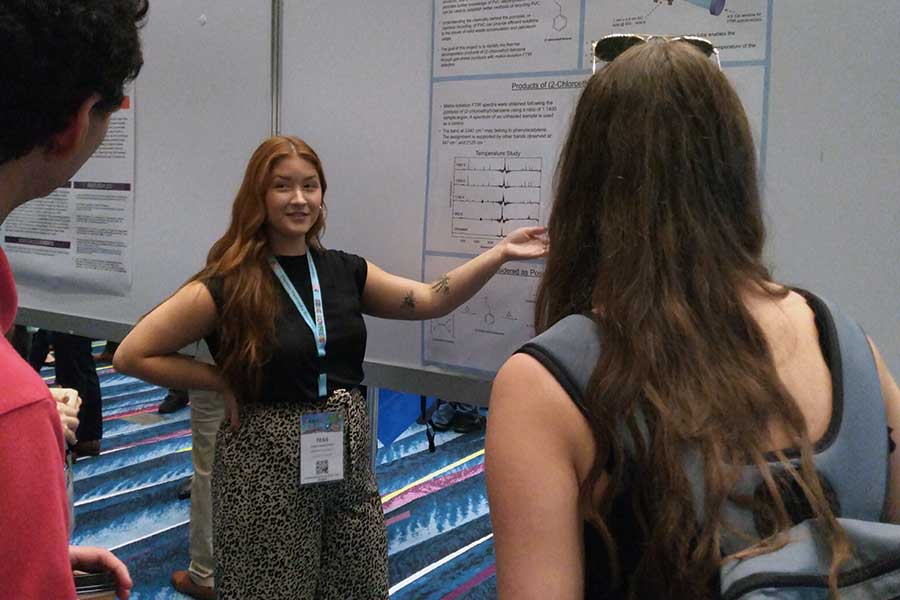 Chemistry student presenting their research at a conference in San Juan, Puerto Rico
