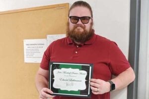 Chemistry lab manager Ed Lukhmanov receives John Marshall Service Award