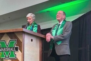 Drs. Lonnie and Ellen Thompson, College of Science alumni, being recognized for their work and contributions by the Marshall University Alumni Association