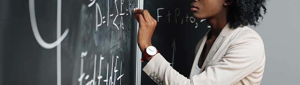 Solving math equations on a blackboard