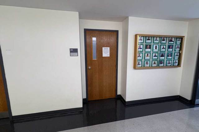 Office door for the Department of Chemistry found in room 450 on the east end of the 4th floor of the Science Building