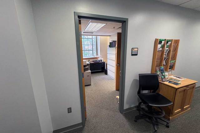 Office door for the Department of Natural Resources and Environmental Sciences found in room 116 on the east end of the 1st floor of Morrow Library