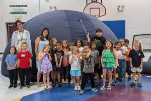 Students at Guyandotte Elementary get a glimpse of the stars courtesy of Physics' portable planetarium