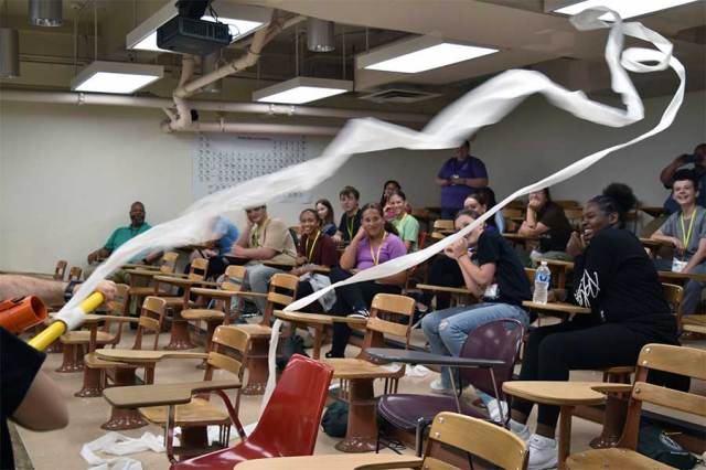 HSTA students dive into science at explosive demo show