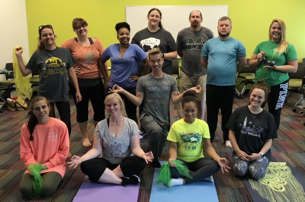 The MUCC Staff Learns YogaEQ!