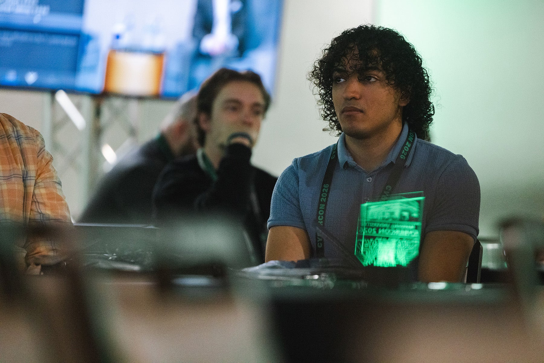 A student listens during a CyberCon session