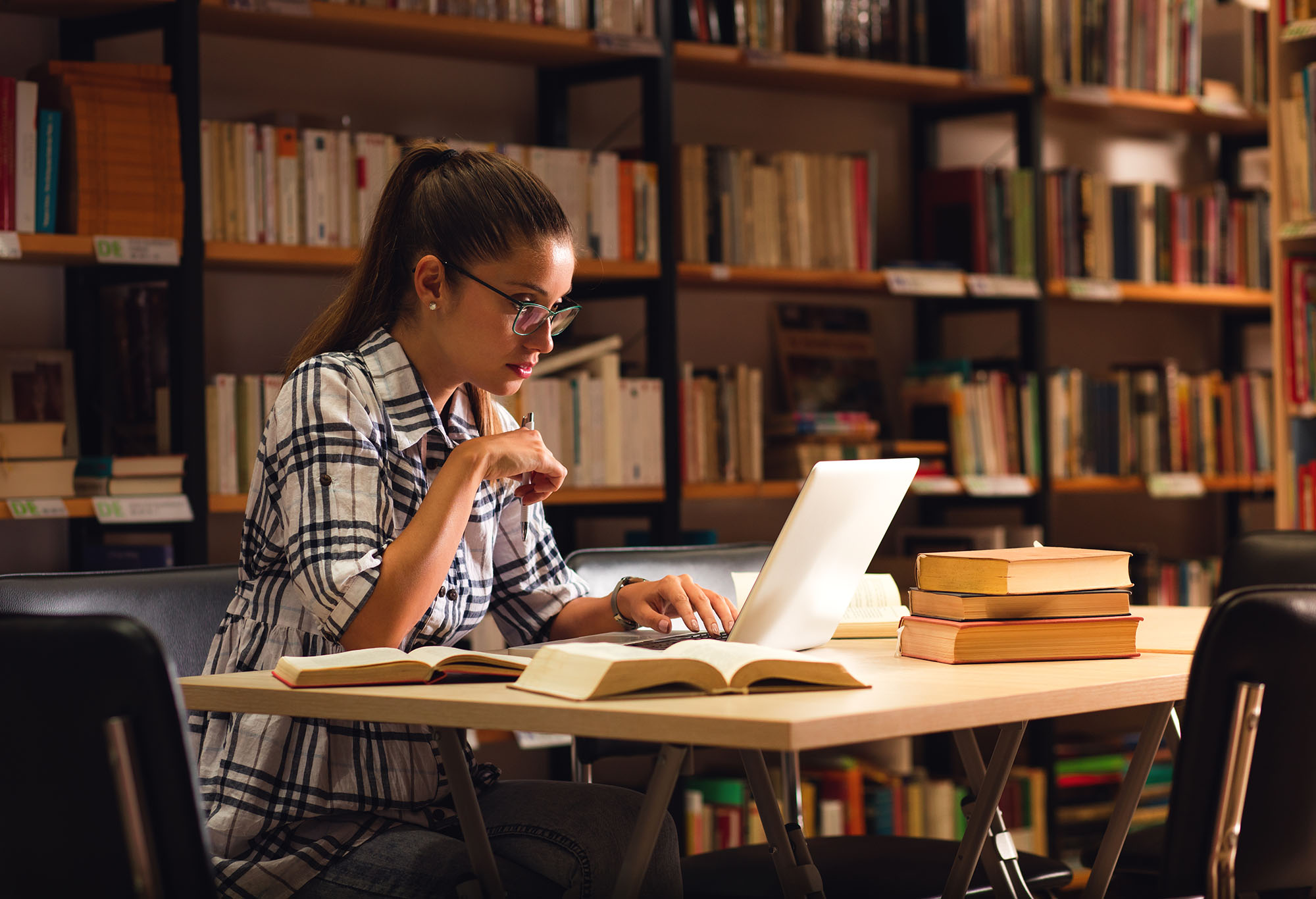 Image of a student in a library