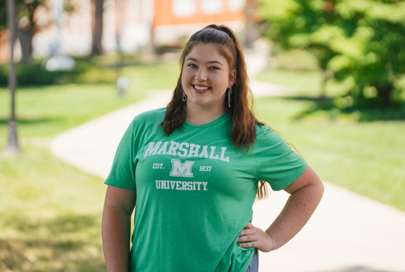 Image of student in front of Old Main