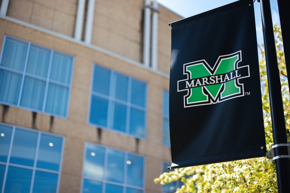 black Marshall M flag on campus