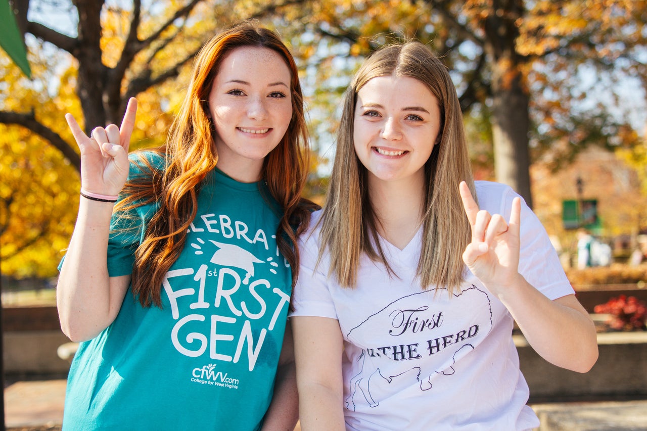 Students wearing First-Gen t-shirts on Marshall's Memorial Student Center Plaza