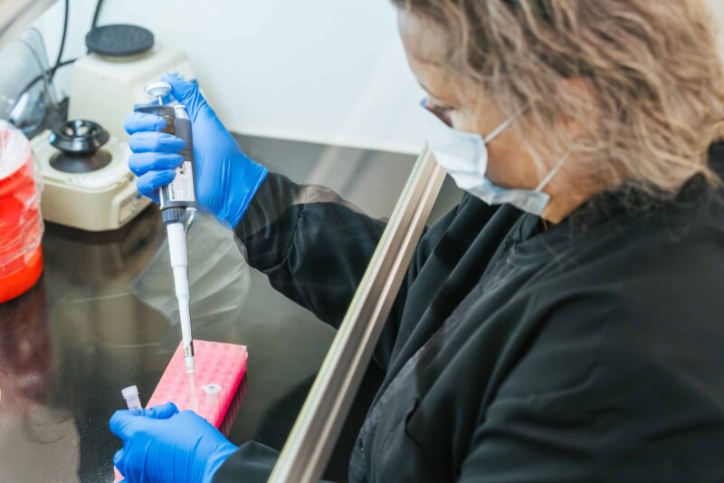 female in forensics lab