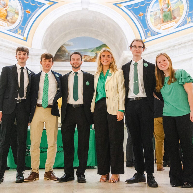 Students smile together at Marshall Day at the Capitol