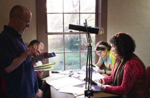 Faculty &amp; students working with the Glenwood Estate archives.