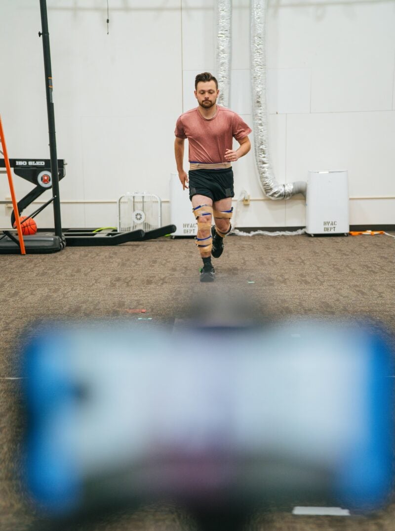 student running in a biomechanics lab