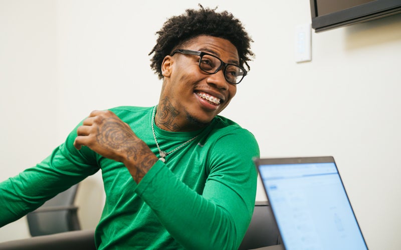A student receives assistance from the Marshall University HELP Program