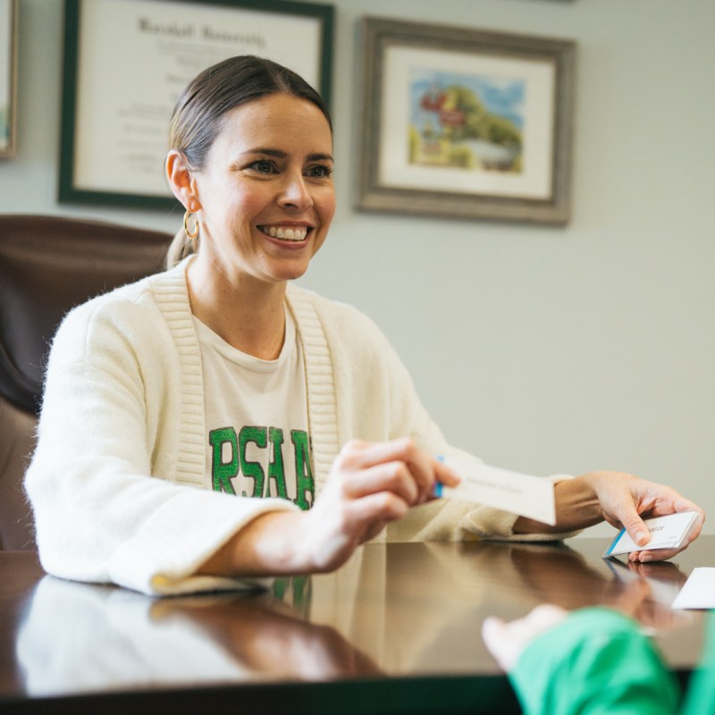 HELP Center director, Hillary Adams works with a student at Marshall University