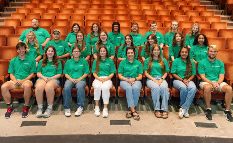 Marshall University First Year Residence Halls' RA together for a group photo in the playhouse