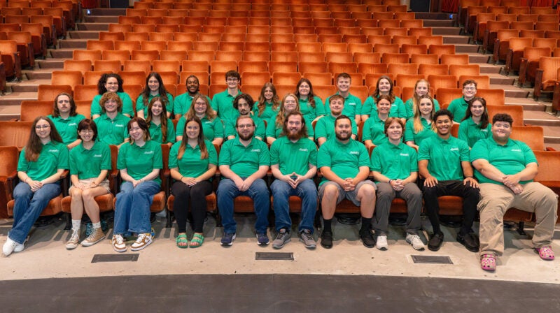 Twin Towers Residence Hall Staff gathered together for a group photo in the playhouse