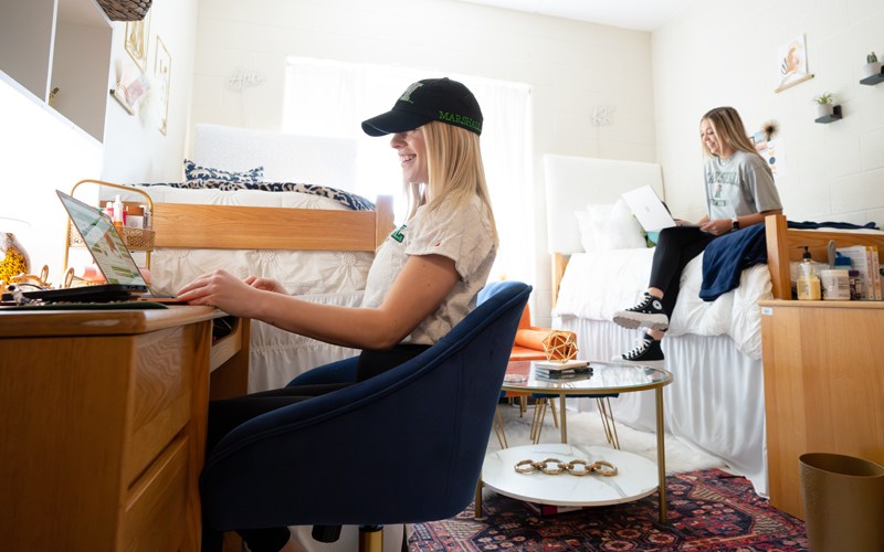 Students study in their residence hall room in Marshall Commons