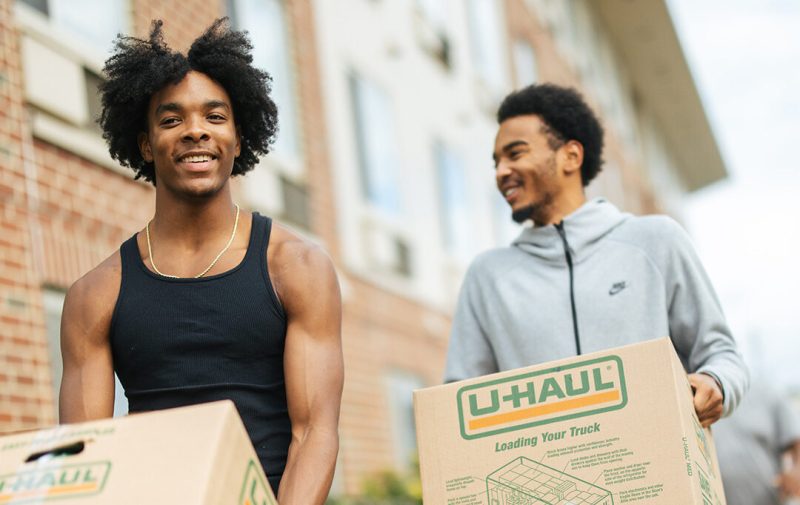 Students moving boxes into the residence halls at Marshall University