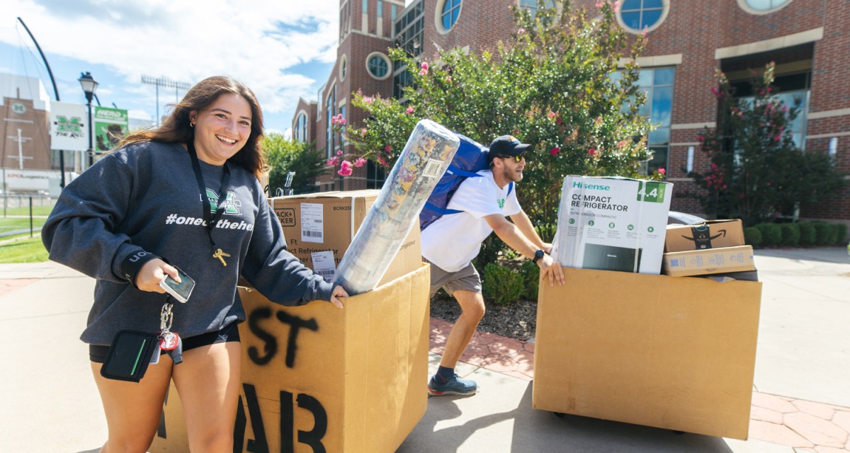 Students move items into residence halls at Marshall University