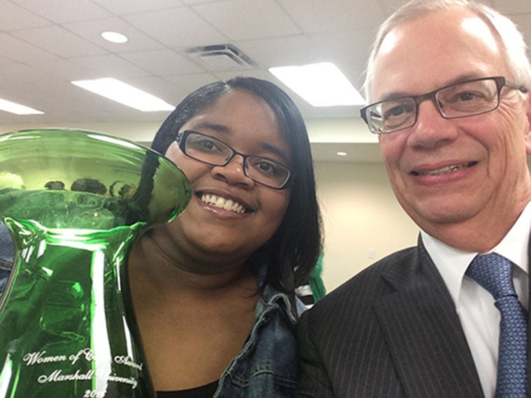 President Dr. Gilbert and President of Black United Students Ashley Spencer at Celebration Women of Colors