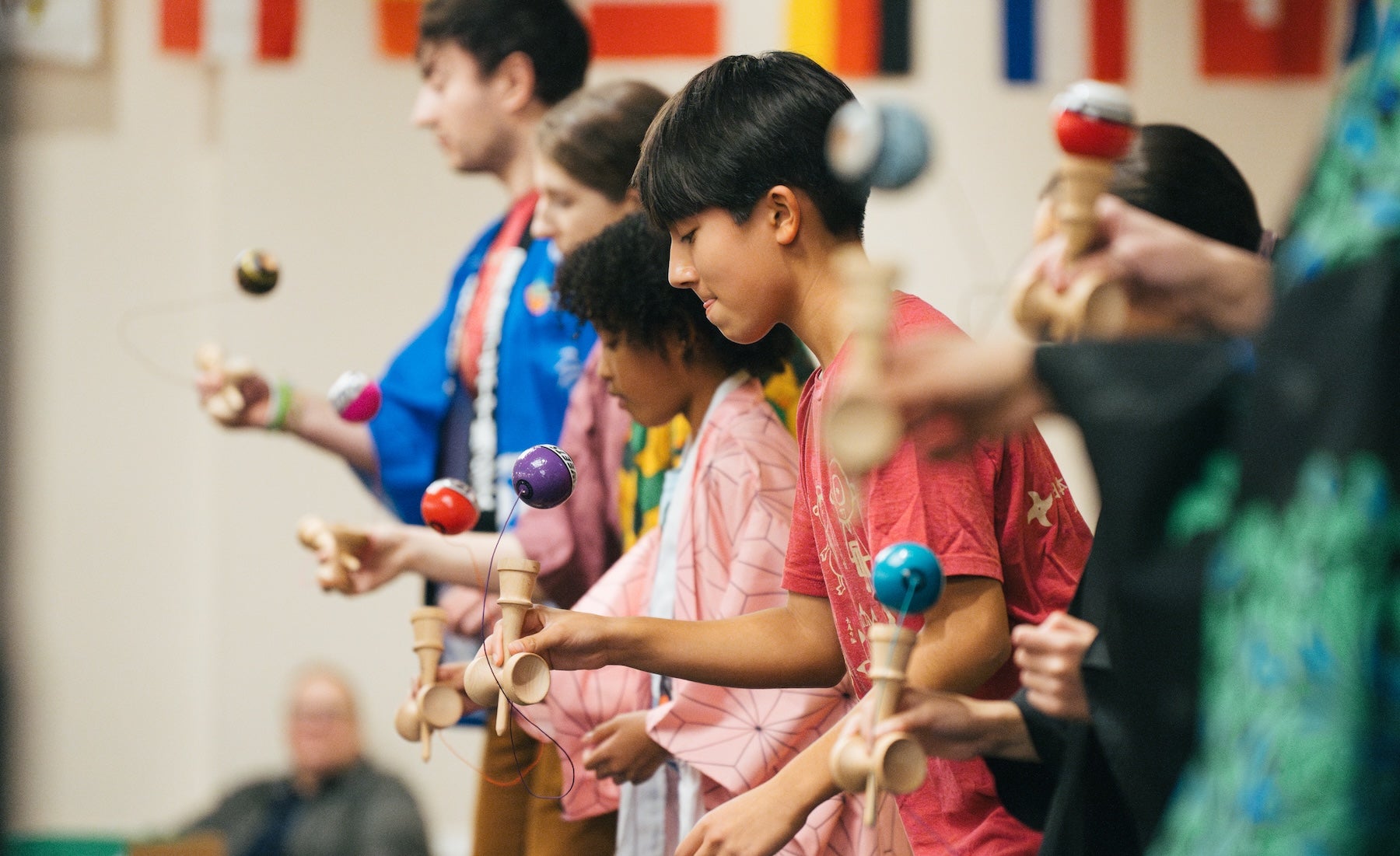 line of students participating in a game at the International Festival