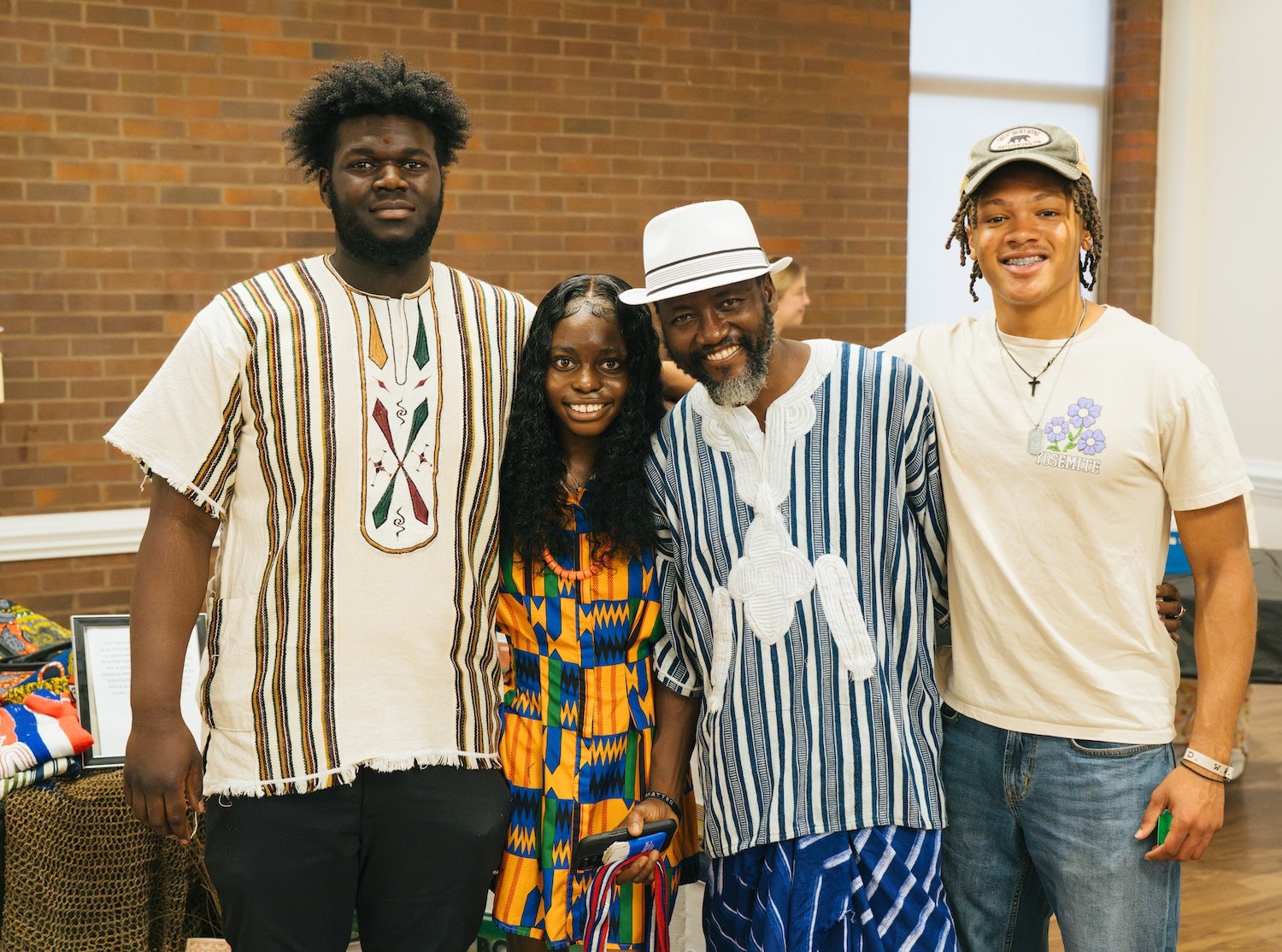 group of four people at the International Festival on campus