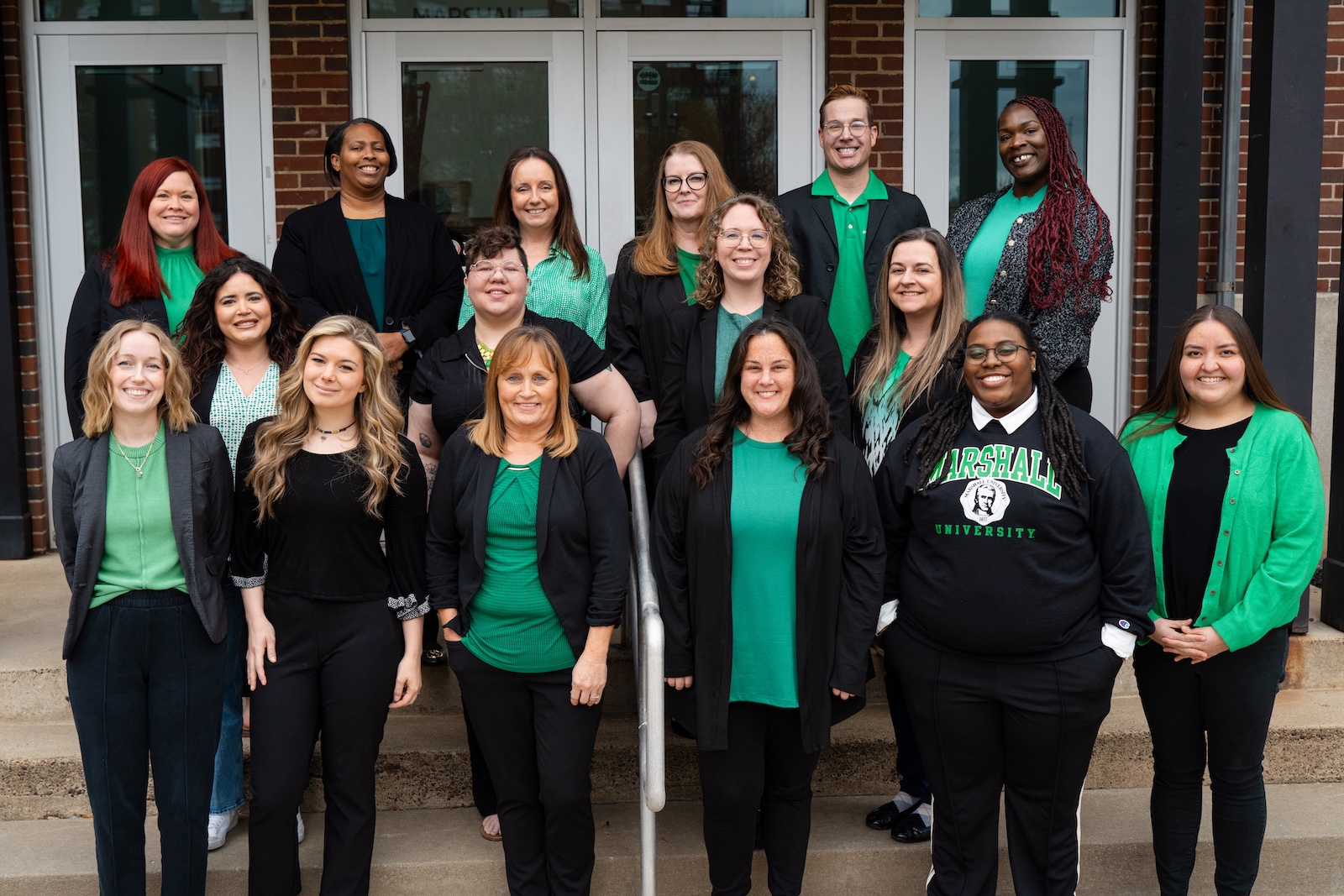 counseling center staff on the steps of Old Main