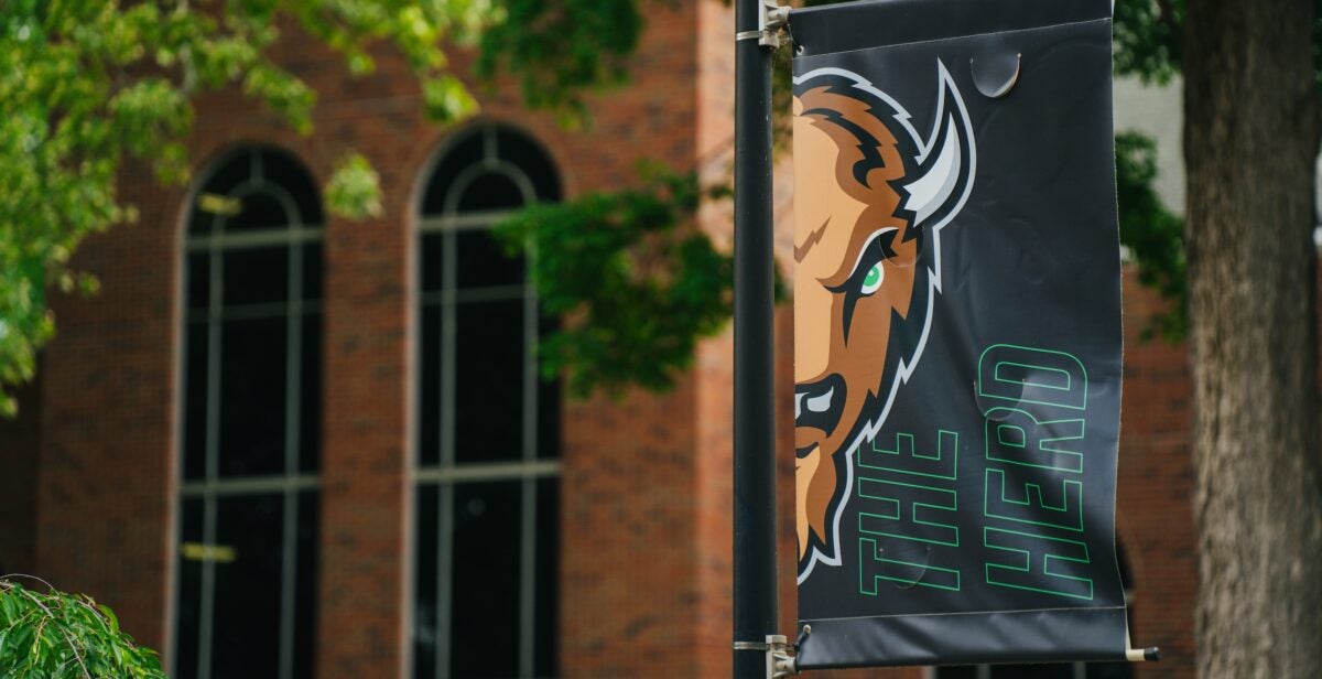 black flag with Marco on it on campus